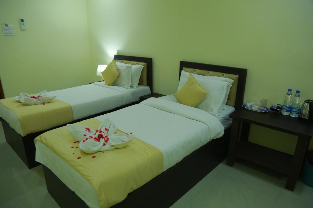 Hotel Sky Park Shamshabad Bagian luar foto